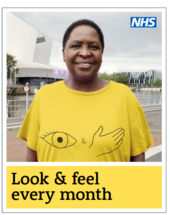 A Black lady with short black wearing a green T-shirt featuring an eye and hand symbol in Manchester
