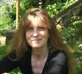 A photo of Anne-Laure smiling 