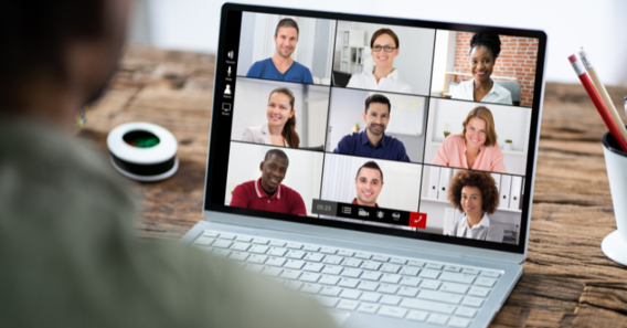 Image of a laptop and an online meeting