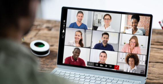 Image of a laptop and an online meeting