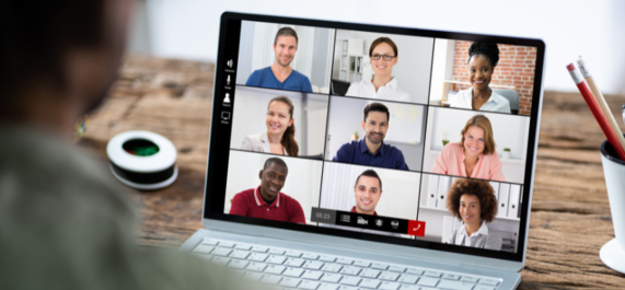Image of a laptop and an online meeting