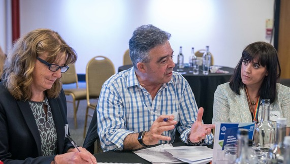 Small group of people taking part in a workshop