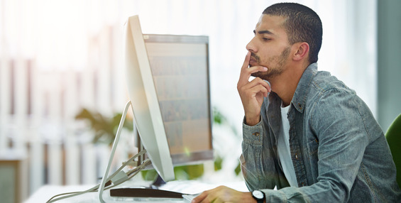 Someone reading on a computer
