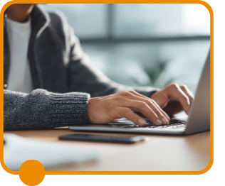 hand typing on laptop