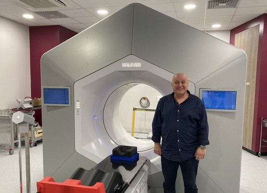 First patient Paul stood by the Trust's new Halcyon machine 