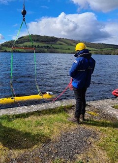 A2KUI being winched into the water at Loch Ness