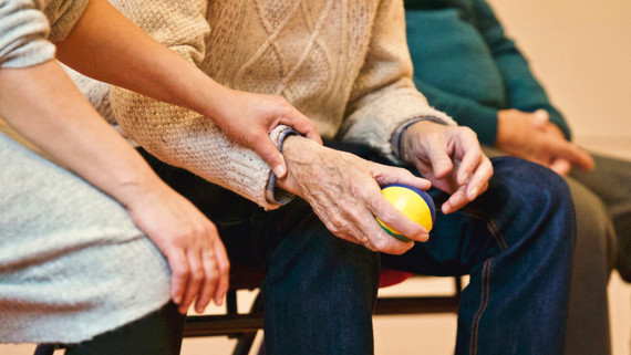 Person holding stress ball