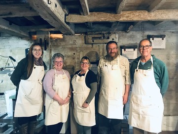 Visitors at a Cogglesford Watermill Milling Experience 