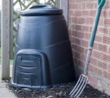 black compost bin in garden
