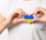 info graphic showing a Ukrainian flag in the shape of a heart