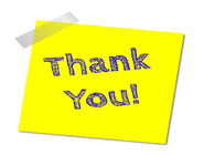 A post it note with message saying thank you