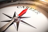 A compass with the arrow pointing to the word career