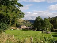 Hagg Farm, a beautiful green landscape with rolling hills in the background