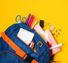 Backpack containing school supplies