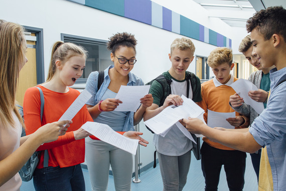 A level students opening their exam results.