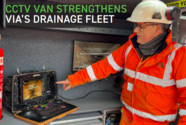 Via staff looking at video footage of a drain