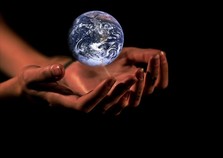 Hands hold the planet