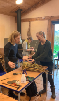 Bodfari Woodland Skills centre course participants make a willow basket