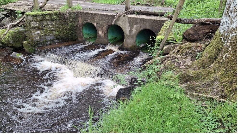 A pipe bridge that is a barrier to fish migration and natural gravel movement