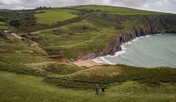 Family walking at Mwnt Ceredigion