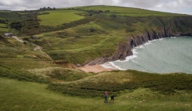Family walking at Mwnt Ceredigion