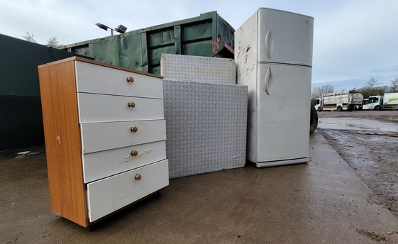 Image showing a chest of drawers, a mattress and a fridge freezer 