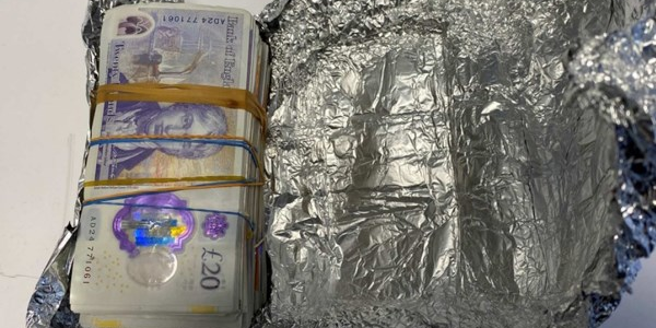 One of the bundles of money unwrapped