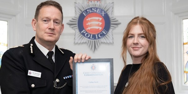 Caitlan Smith receives her Commendation certificate from Chief Constable Ben-Julian Harrington
