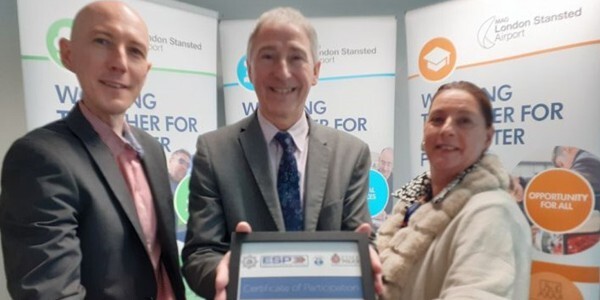 Les Hawkins (centre) with MAGs Daniel Burford and Jane Long