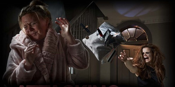 A young woman throwing a clutch bag in anger at her mum after returning home from a night out