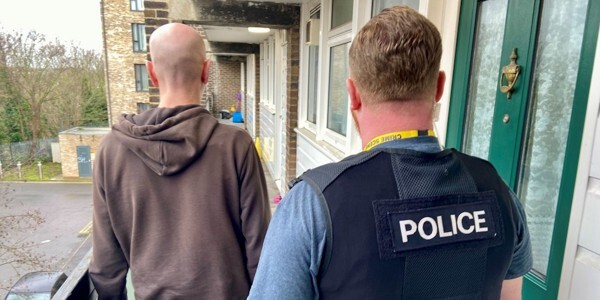 POET officers on their way to visit an offender