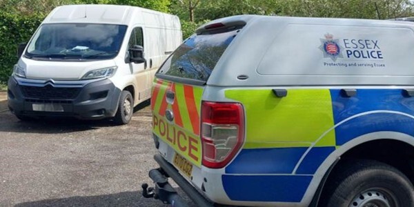 The while Citroen van and an Essex Police 4x4 vehicle