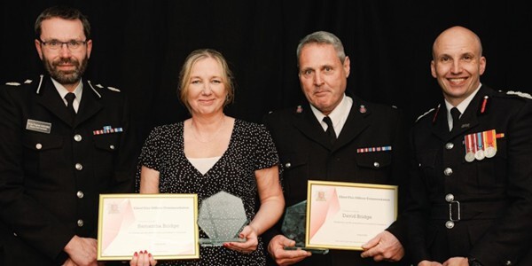 DCC Andy Prophet. Samantha and Dave Bridge holding awards and certificates. Essex Chief Fire Officer Rick Hylton.