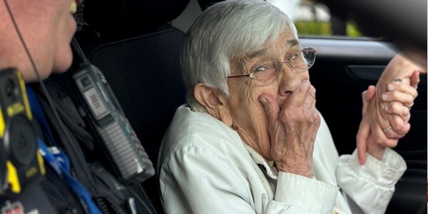 100 year-old Gwen Lewis gets emotional as the ride-along is about to start.