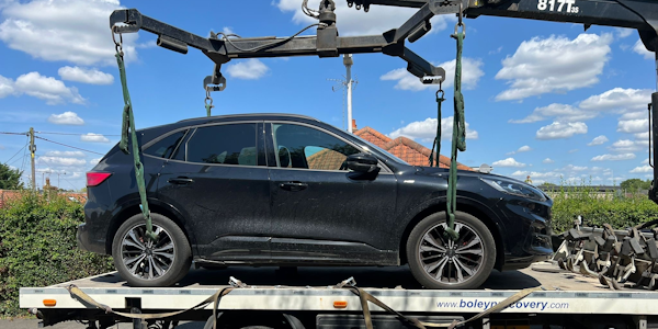 Ford Kuga on rear of recovery vehicle