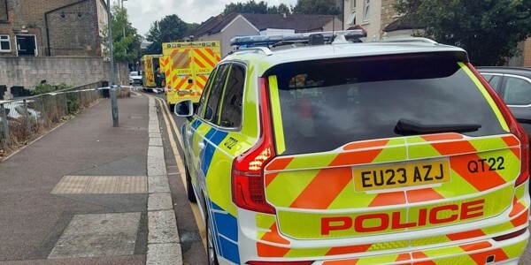 Police car and scene tape at the location in Grays