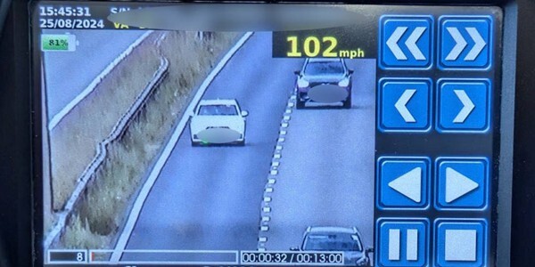 Speed monitoring equipment showing a car travelling at 102 miles per hour