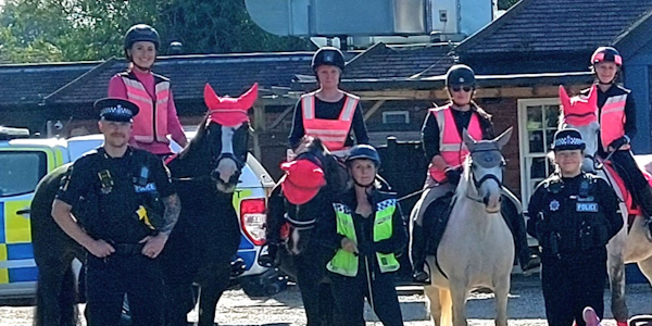 Officers with horse riders