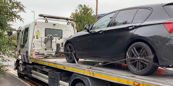 Seized car on recover vehicle