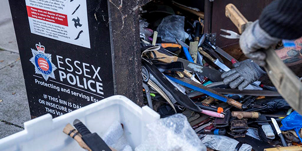 Knife bin being emptied