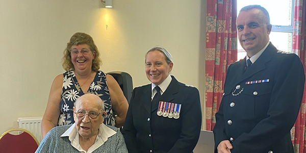 PC Eric Birkin with Ch Supt Claire Talbot and Det Chief Insp Rob Huddleston