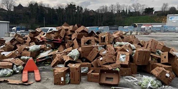 bricks and debris across the road after lorry was ransacked