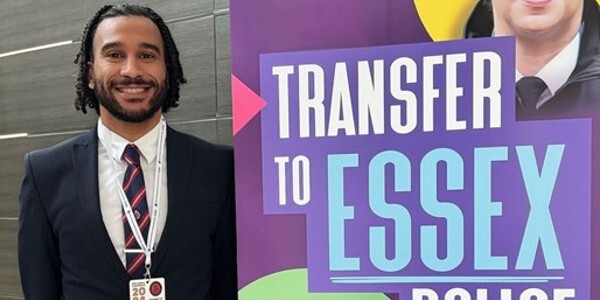 PC Luke Watson next to a banner that reads 'Transfer to Essex Police'