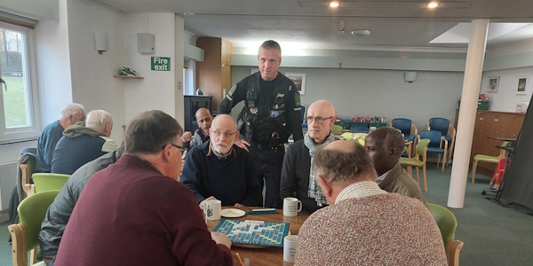 PC McNamara speaking with people at the jubilee hub