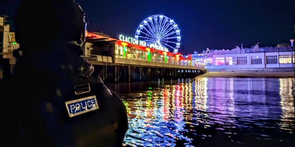 Marine Unit boat in the water at night next to Clacton Pier
