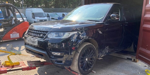 Stolen car being taken out of a shipping container