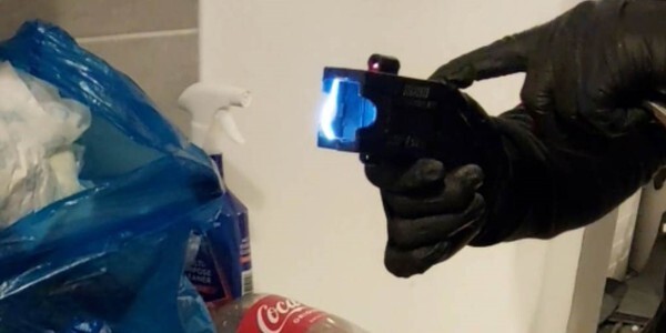 Officer holding a stun gun discovered at the scene