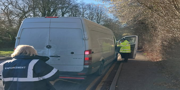 Rural Engagement Team and Enforcement Officers speaking to a driver