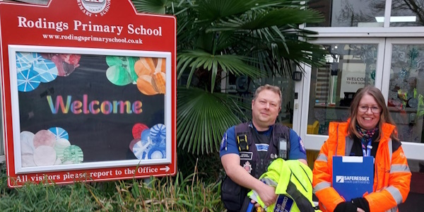 PCSO O'Donnell Smith and Safer Essex Roads outside The Rodings Primary School