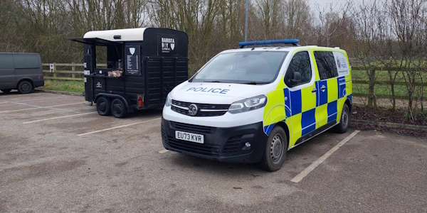 Police Van parked next to a coffee cart in Flitch Green